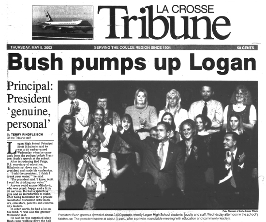 Bush_2002-5-9_Trib_pA1_Bush_Pumps_up_Logan_crop_550w.jpg