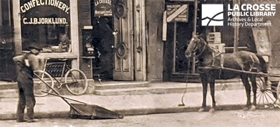 318_Main_St_Leitholds_circa_1889_enhanced_cropped_to_street_sweeper_and_horse_credit_550w.jpg