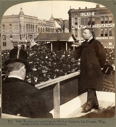 Underwood_stereoview_Theodore_Roosevelt_speaking_in_La_Crosse_April_4_1903_derivative.jpg